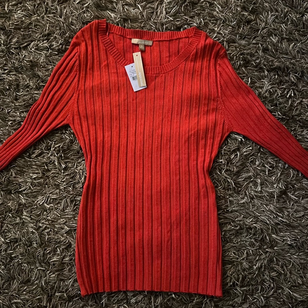 Nice bright Orange sweater with two zippers on the side